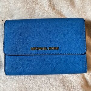 Michael Kors Vibrant Blue Wallet
No strap